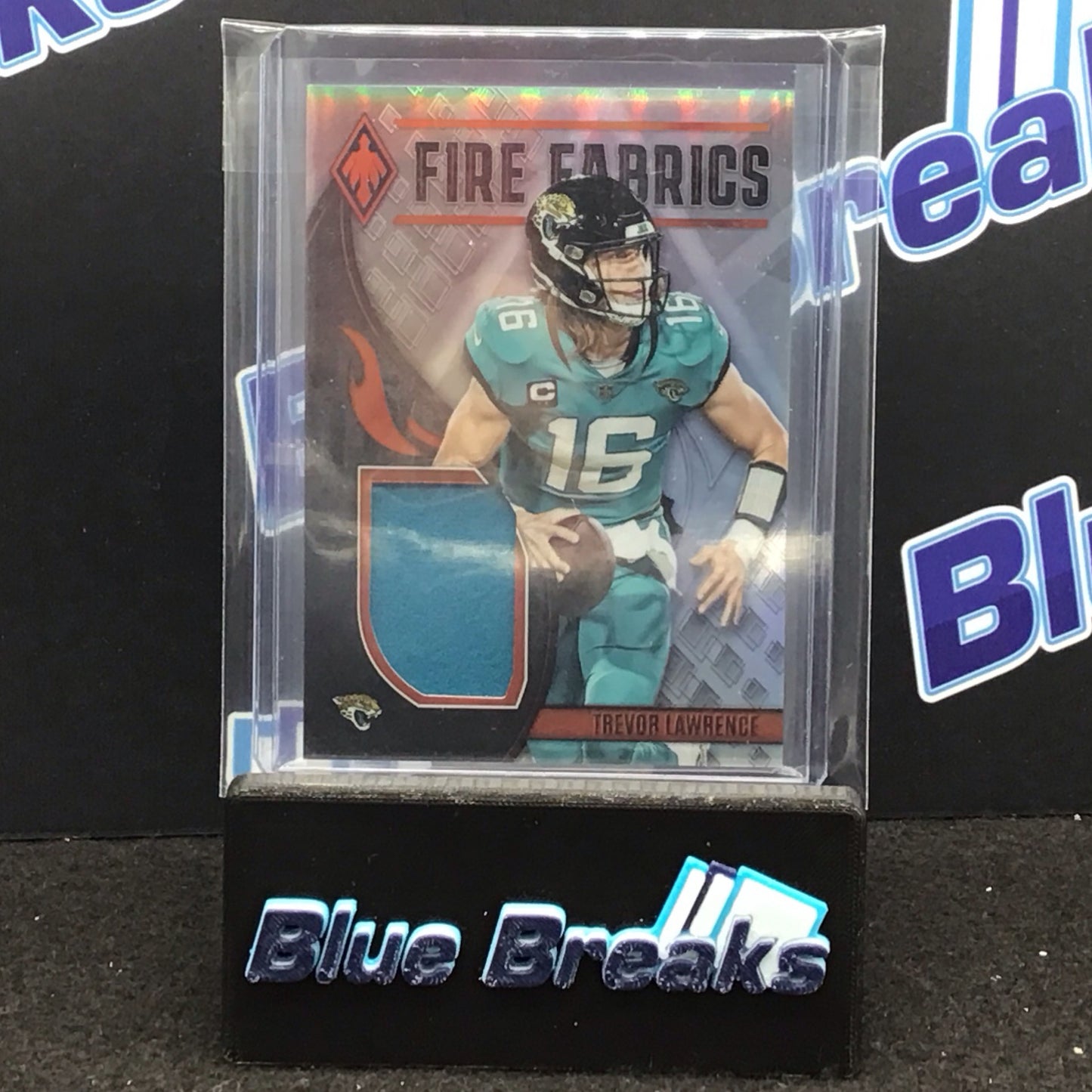 2023 Panini Phoenix Fire Fabrics Trevor Lawrence 103/150 #FIRE-5 Jaguars