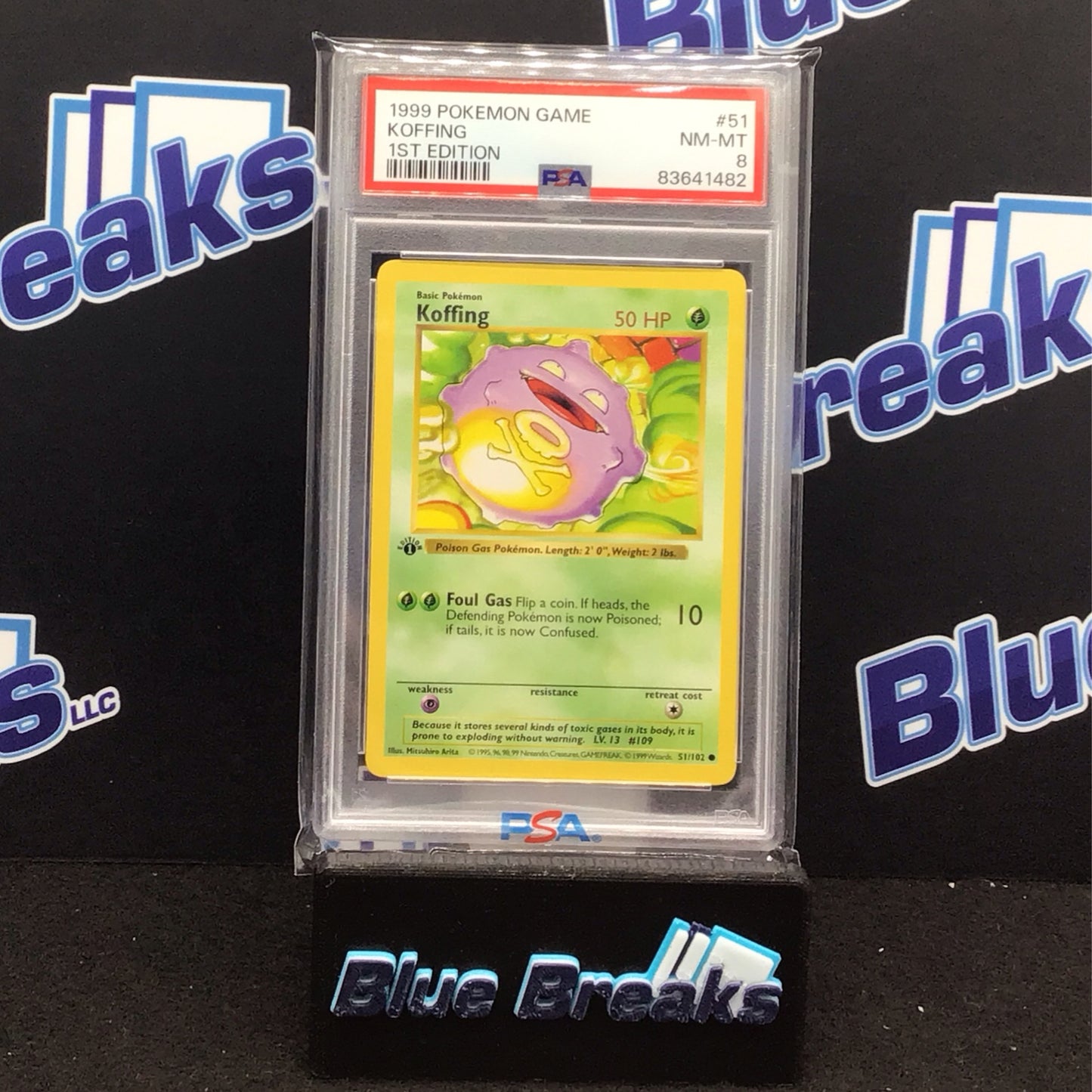 1999 Pokémon Game 1st Edition Koffing #51 PSA 8