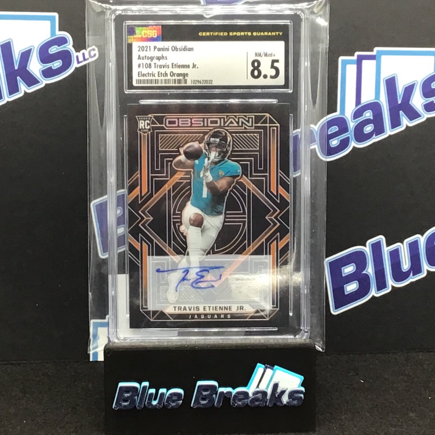 2021 Panini Obsidian Electric Etch Orange Travis Etienne Jr auto 1/75 #108 CSG 8.5 Jaguars