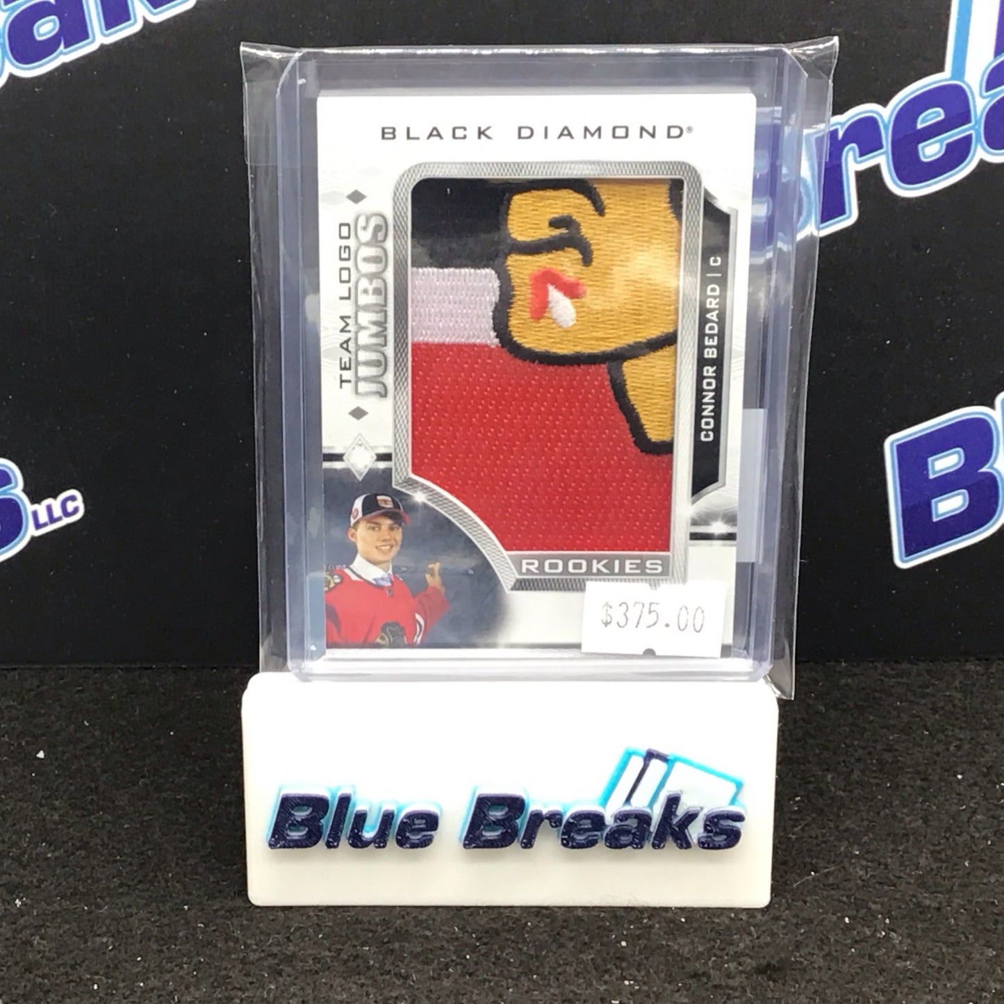 2023-24 Upper Deck Black Diamond Team Logo Jumobs Rookie Connor Bedard #RTL-CB Blackhawks