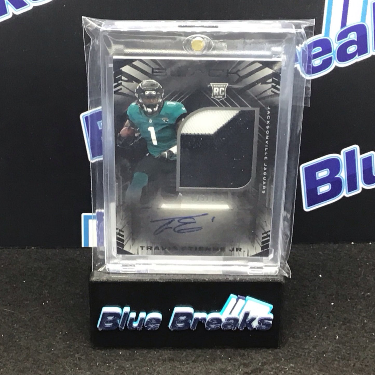 2021 Panini Black Travis Etienne Jr relic auto 035/199 RC #208 Jaguars