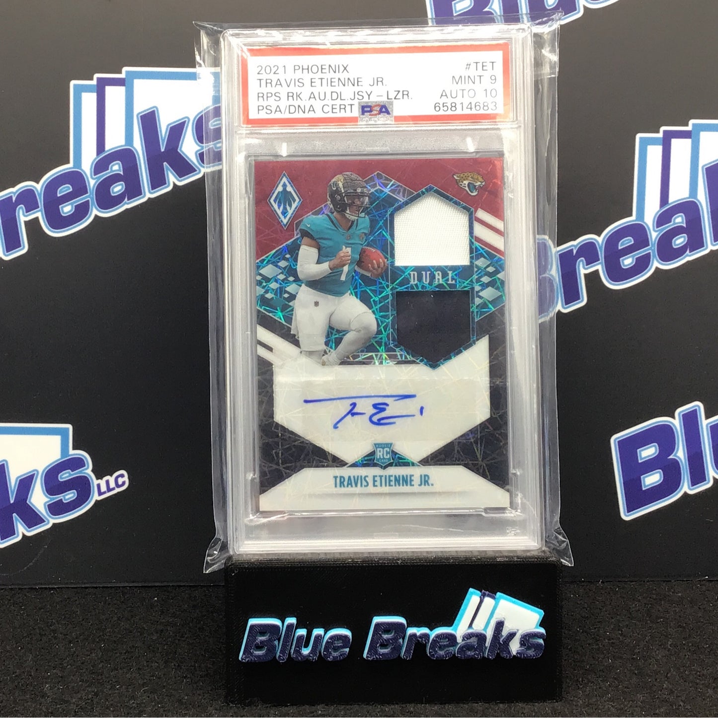 2021 Phoenix - Travis Etienne - RPS -  Jersey Lazer - Dual - #TET - PSA 9 - Auto PSA 10 - Jacksonville Jaguars