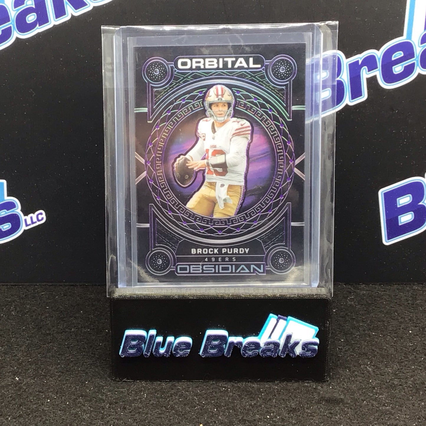 2023 Panini Obsidian Brock Purdy Purple Orbital 53/75 #20 - San Francisco 49ers